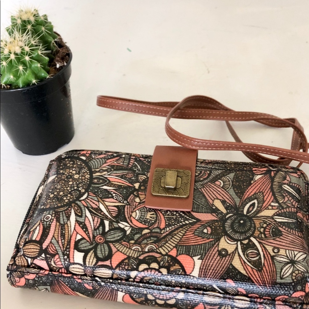 Clutch wallet size purse with arm strap